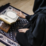 About Us muslim woman reading from the quran