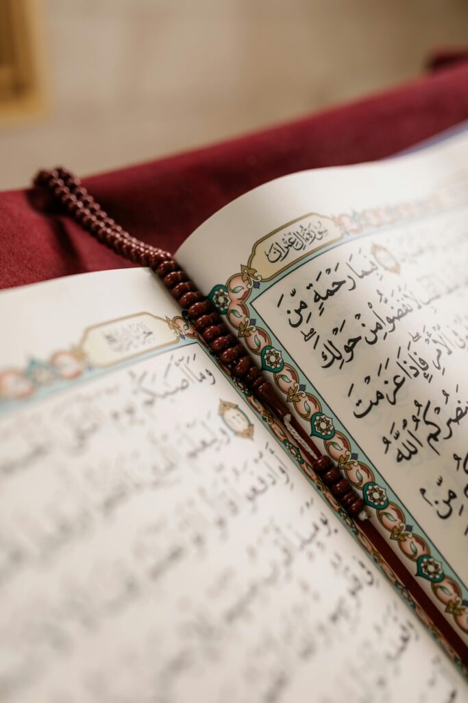 pexels photo 8164567 8164567 Detailed image of an open Quran with prayer beads, symbolizing Muslim culture and spirituality.